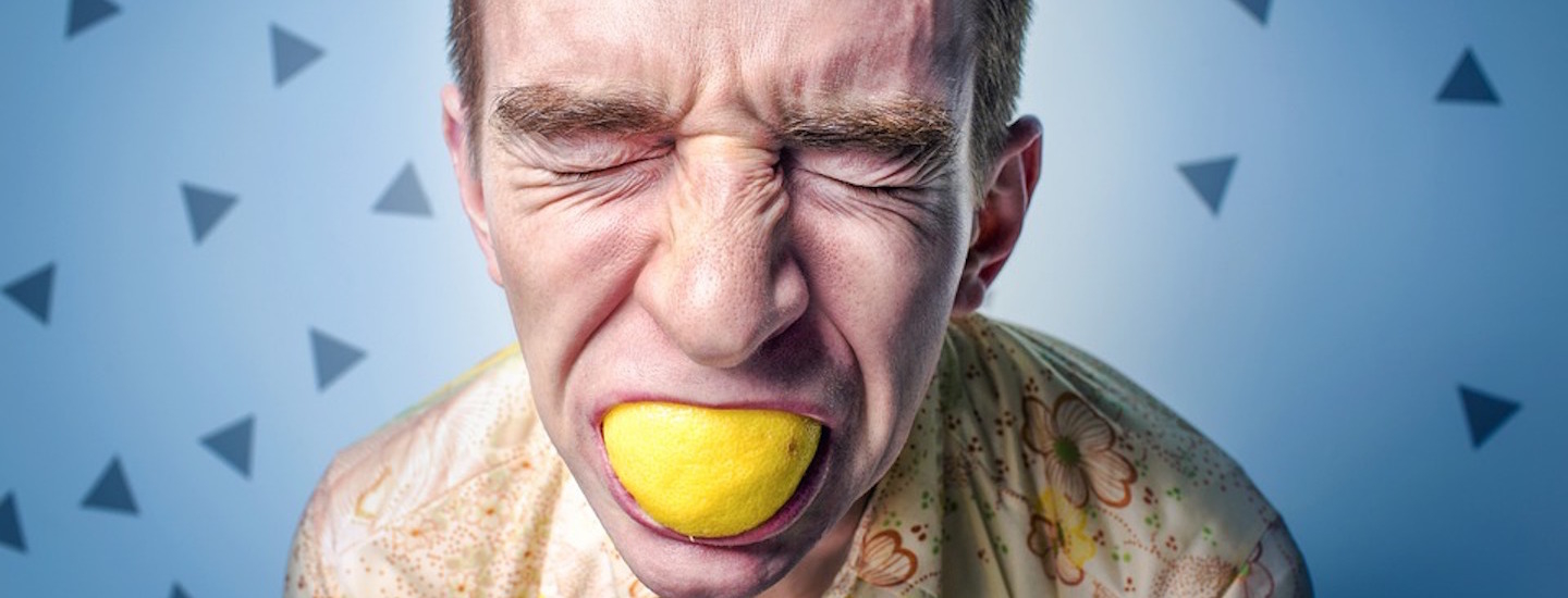 Stress of an adult man with a lemon