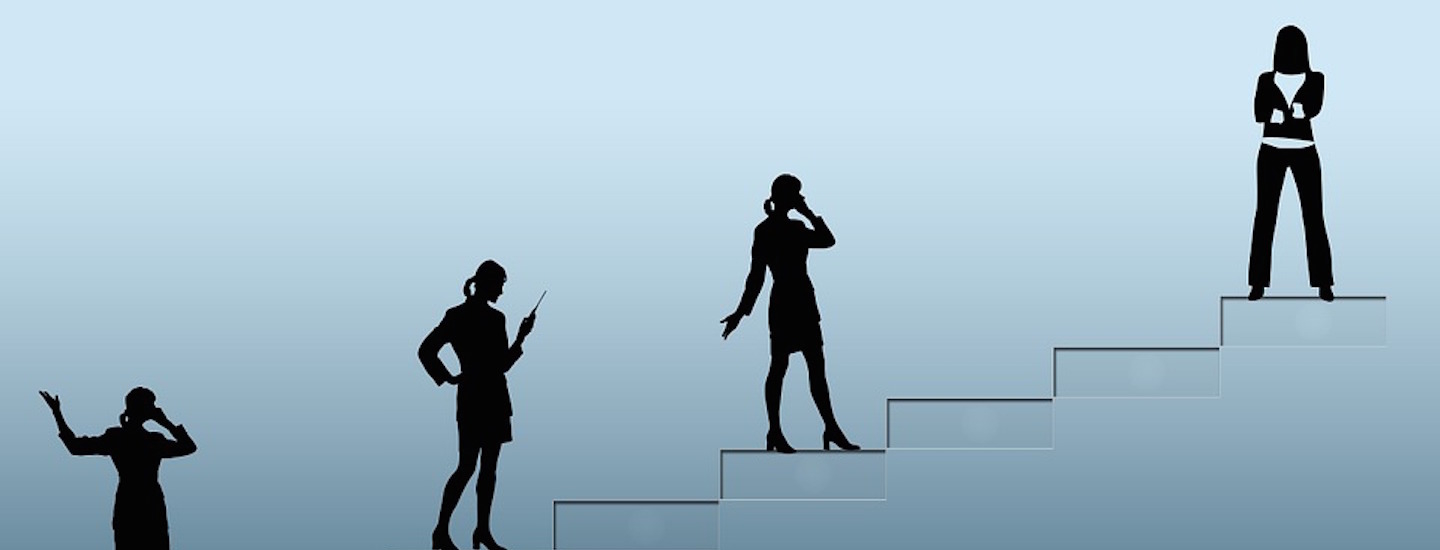 Ambition woman going up a ladder