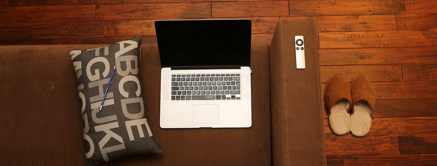 Home office notebook couch sofa header