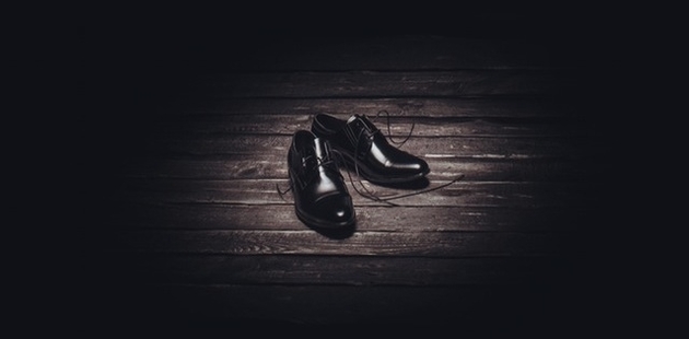 Big shoes wooden floor indoors 1