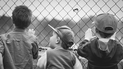 Middle children looking for or at something