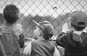 Small children looking for or at something