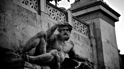 Middle statue is reflecting black and white