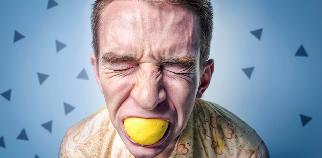 Big stress of an adult man with a lemon