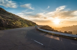 Small road dawn mountains sky